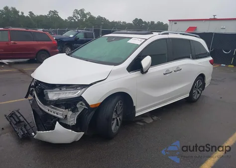2022 Honda Odyssey Touring z USA, uszkodzony, nr VIN 5FNRL6H8XNB043345